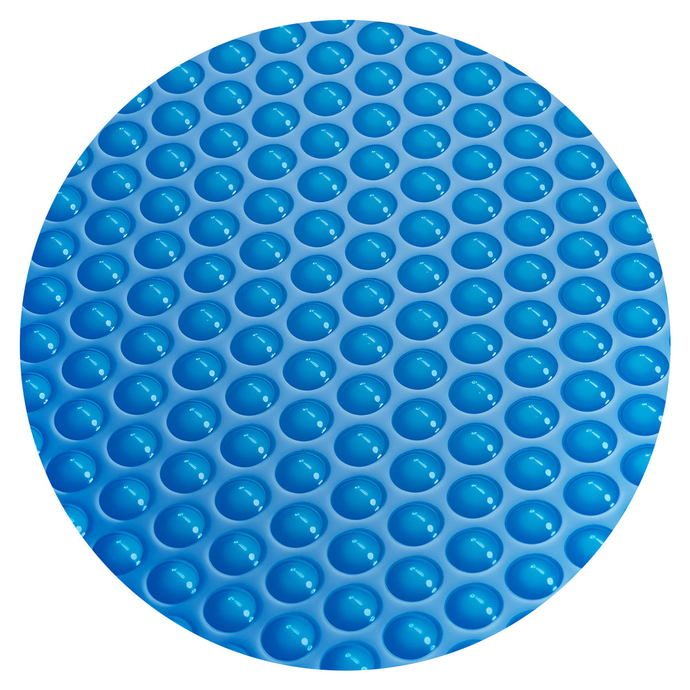 Close-up of the blue bubble design of a 12 mil solar pool cover, enhancing heat retention and reducing evaporation.