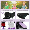 Close-up of the comfortable padded seat and non-slip handle with bell on the 12-inch Magic Purple kids bike for safety.