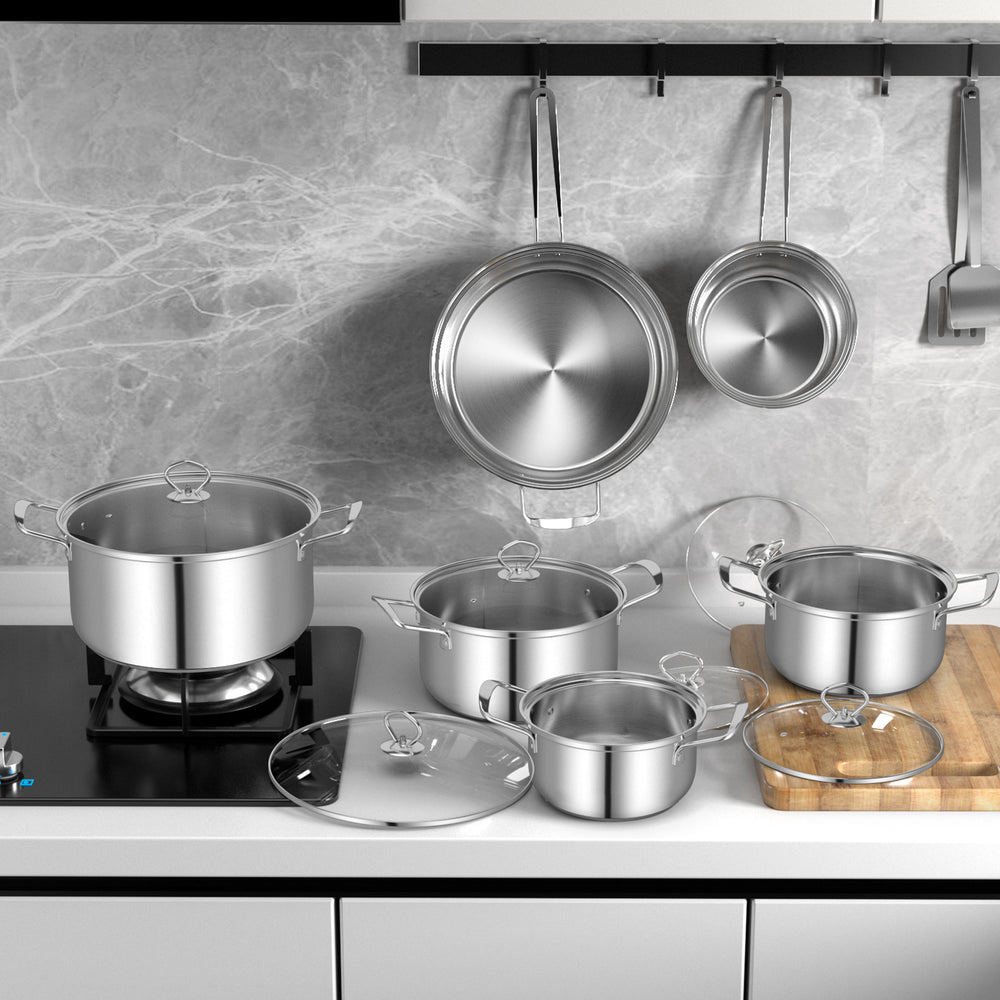 12-piece stainless steel pots and pans set with tempered glass lids, including various sizes for versatile cooking.