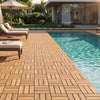 Acacia wood interlocking deck tiles arranged by a pool, showcasing a waterproof design for outdoor spaces.