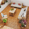 Acacia wood interlocking deck tiles arranged on a patio, showcasing natural beauty and waterproof design for outdoor.