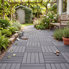Gray 12” x 12” waterproof PP plastic interlocking deck tiles arranged on a garden path for easy outdoor installation.