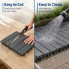 Interlocking 12” x 12” gray PP plastic deck tiles are easy to cut and clean, perfect for outdoor patio use.