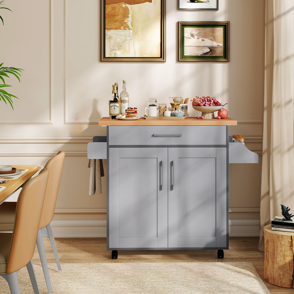 Rolling kitchen island cart in gray with spacious countertop, adjustable shelf, and towel/spice racks for organized.