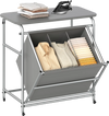 3-section laundry sorter with foldable ironing board, gray fabric, and lockable wheels for easy sorting and access.