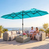Double-sided 13FT turquoise patio umbrella with solar lights, providing shade for outdoor relaxation by the pool.