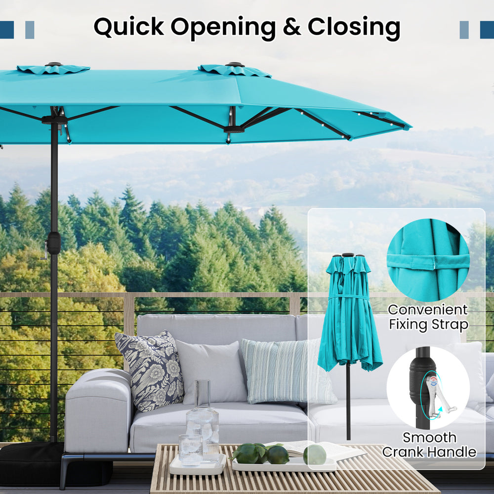 Double-sided turquoise patio umbrella with solar lights, featuring a smooth crank handle and sturdy metal poles for.