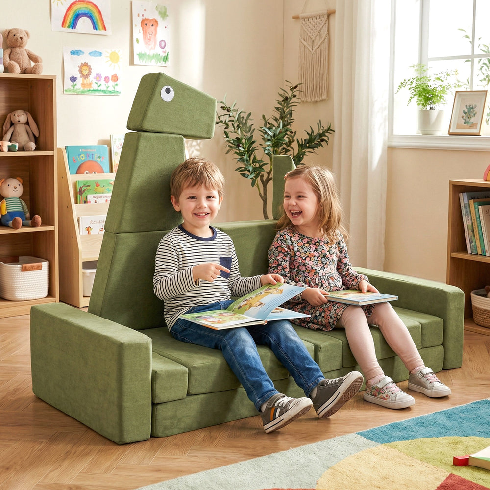 Modular kids play couch in green velvet, featuring two children reading, perfect for inspiring creativity and family.