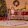 Kids gymnastics bar in pink, adjustable to 5 heights, supports up to 143 lbs for safe indoor or backyard practice.