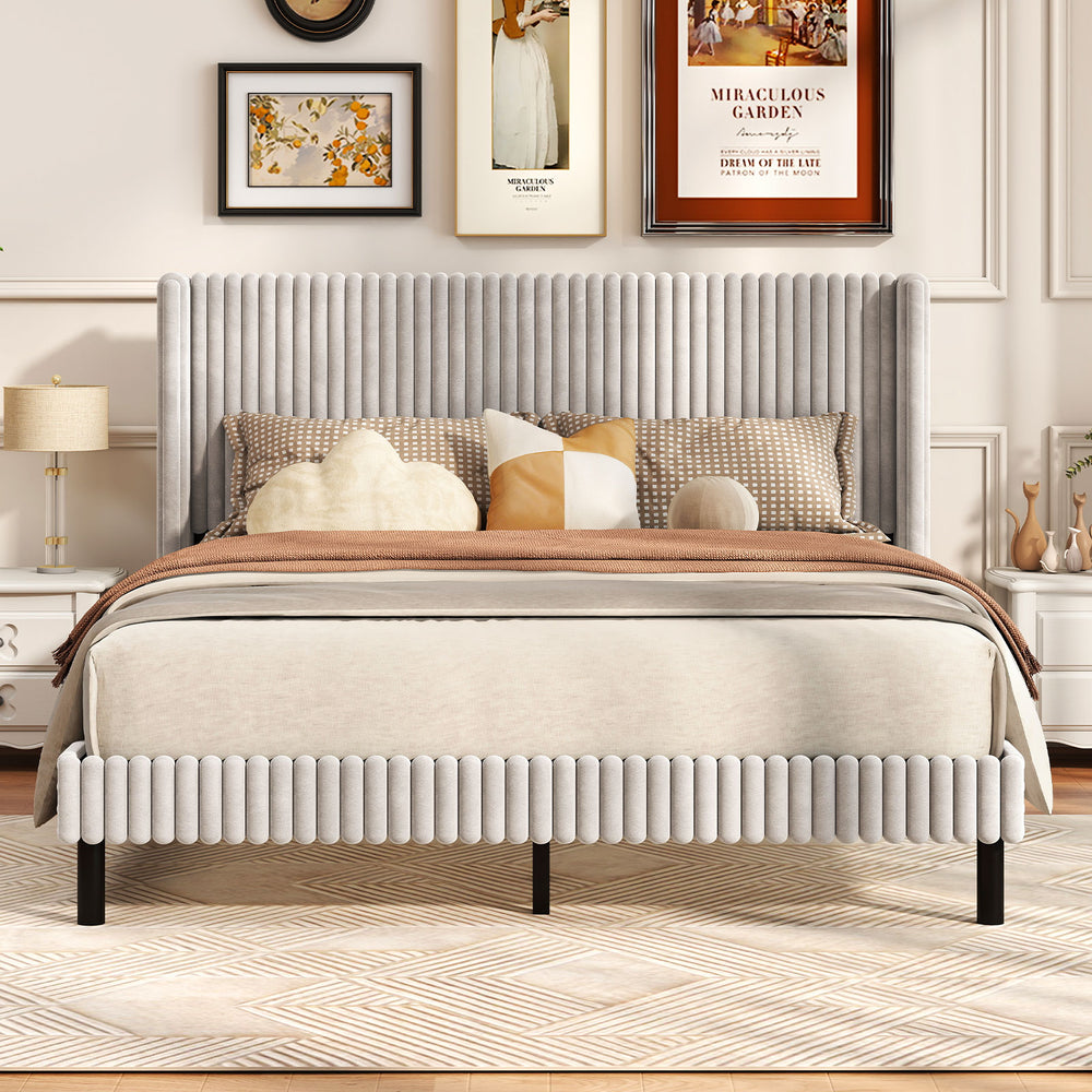 Queen size velvet bed frame with wingback headboard, showcasing a vertical channel design and plush upholstery for.