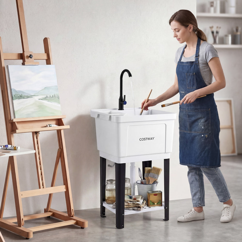 Utility sink with 14.5 Gal capacity, rotating faucet, and adjustable legs, ideal for laundry and cleanup tasks.