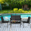 4-piece black patio furniture set featuring a glass top coffee table, loveseat, and two single sofas for outdoor.