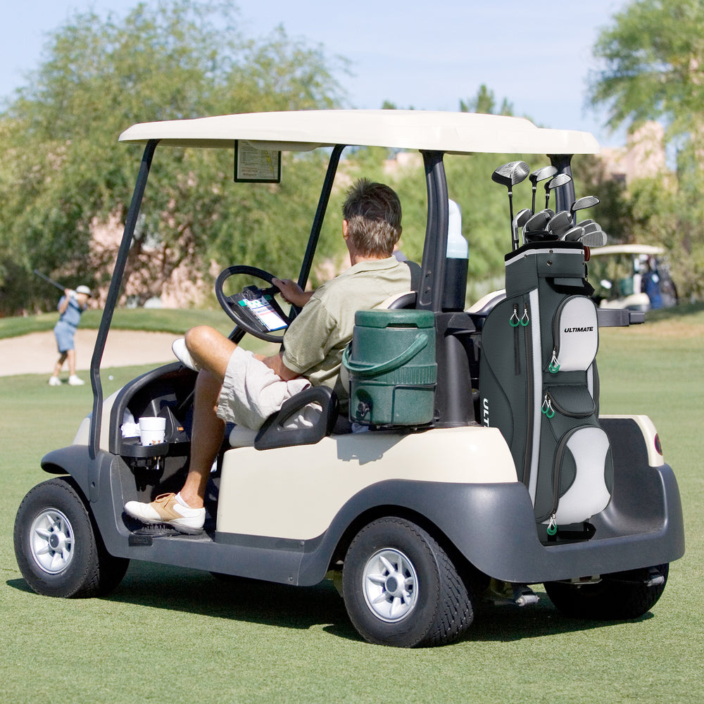 Golf cart bag with 14 dividers and 7 zippered pockets, including a cooler, designed for easy transport on the course.