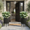 Aesthetic 14-inch fluted metal plant pot with tapered legs, perfect for enhancing indoor or outdoor garden spaces.