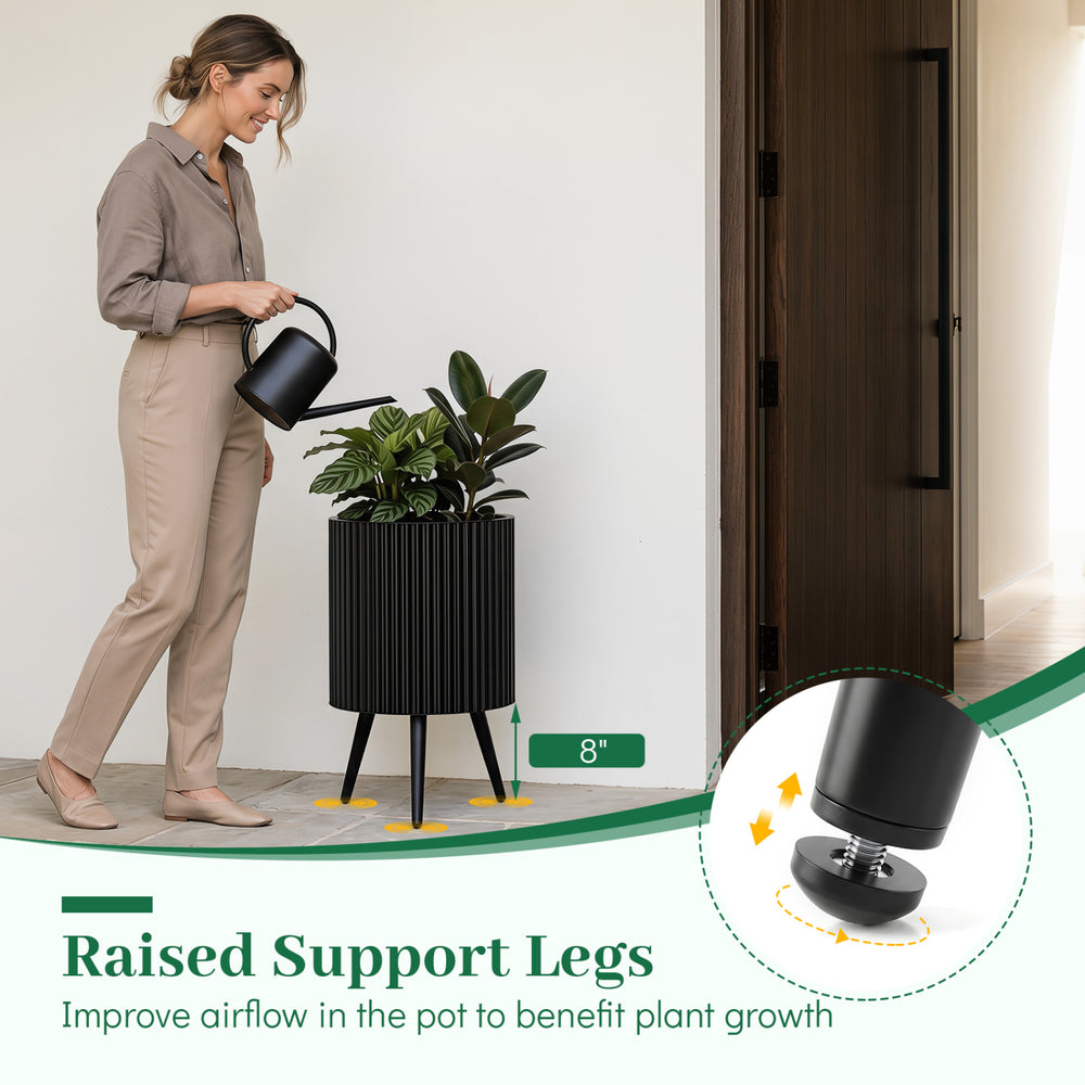 14-inch fluted metal plant pot with tapered legs and raised support for improved airflow, ideal for indoor and outdoor use.