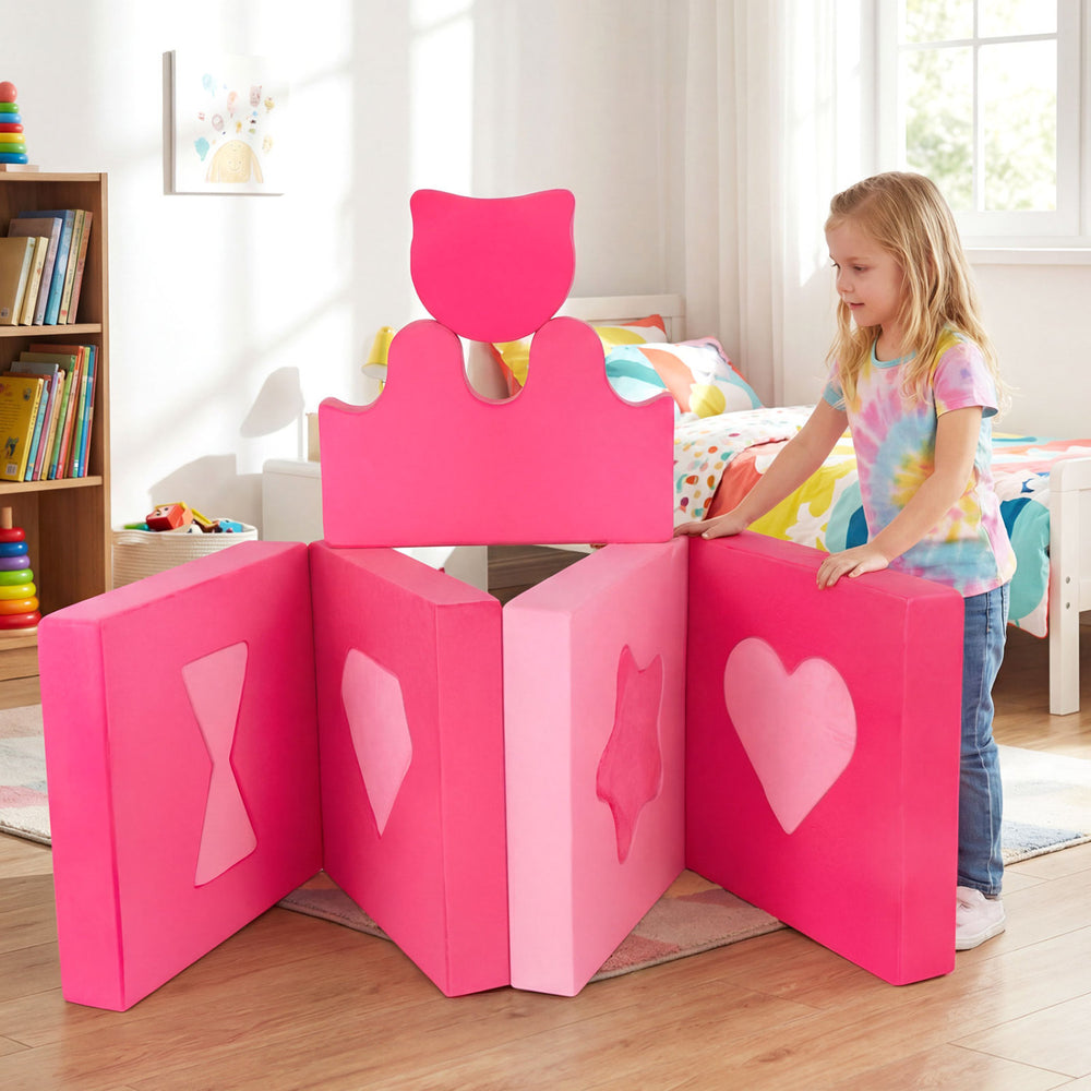 Pink modular foam climbing blocks for kids, featuring various shapes for play, promoting fitness and shape recognition.