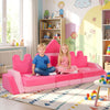 Modular pink kids play couch with 14 foam pieces, promoting climbing and crawling for fun in playrooms.