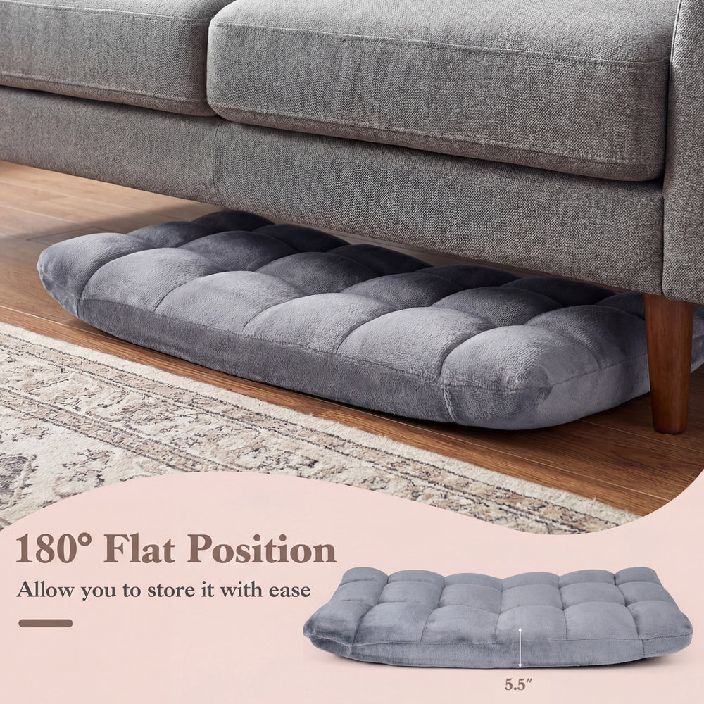 Light gray cushioned floor chair in flat position, featuring thick padding and adjustable design for versatile seating.