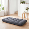 Adjustable gray floor chair with 14 positions, padded seat, and solid metal frame for ultimate comfort and support.