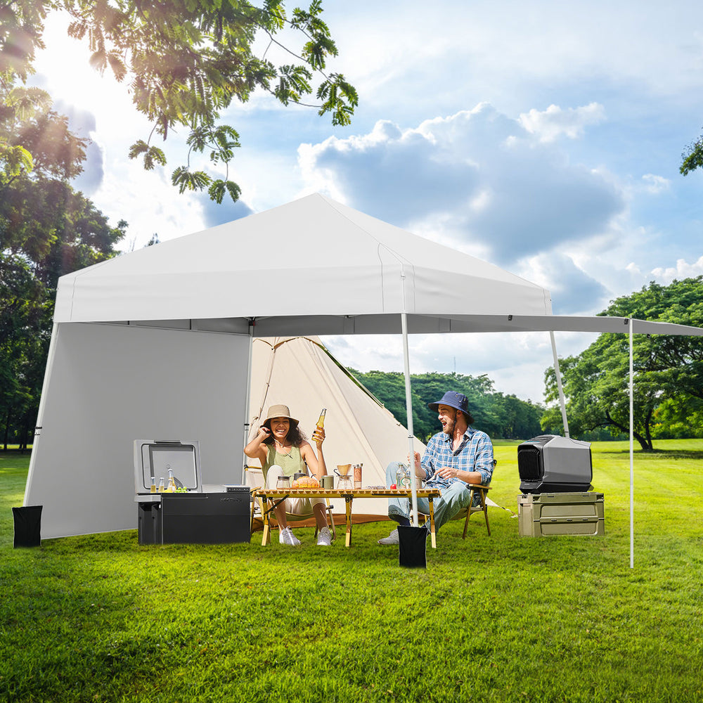 Pop-up canopy tent with two sidewalls for sun protection, ideal for outdoor events and easy setup in any location.