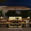 Double-sided 15.5 ft patio umbrella in brown with LED lights, providing ample shade for outdoor seating areas.
