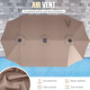 Extra-large 15.5 ft brown patio umbrella with air vent, LED solar lights, and crank handle for easy operation.