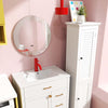 Single bathroom vanity with red faucet, tall cabinet, and compact dryer in a colorful laundry room setup.