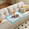 Pet wee pee pad on a couch, featuring soft non-woven fabric and advanced absorbent paper for effective training.