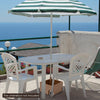 White patio table and chairs with a 150 lbs umbrella base stand, perfect for outdoor coffee setups.