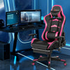 Pink massage gaming chair featuring a 180° reclining backrest and retractable footrest, ideal for gaming and relaxation.
