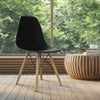 Black Mid-Century Modern DSW dining chair with wood legs, ideal for stylish dining room decor and guest seating.