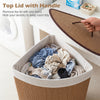 Bamboo laundry hamper with removable liner, top lid, and handle, ideal for keeping laundry tidy in any room.