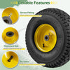 Close-up of a 15 x 6.00-6 tube-type tire showcasing the thickened rim, air valve, and grease fitting for easy.