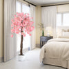 5.5 FT tall artificial cherry blossom tree with pink flowers, showcasing a graceful drooping design for vibrant indoor.