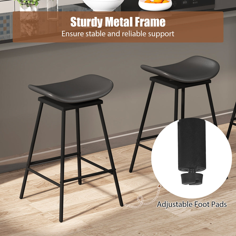 Backless swivel barstool set in black faux leather with sturdy metal frame and adjustable foot pads, ideal for kitchen.
