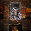Hanging 18-inch animated skull prisoner decoration with LED eyes and sound effects for a spooky Halloween display.