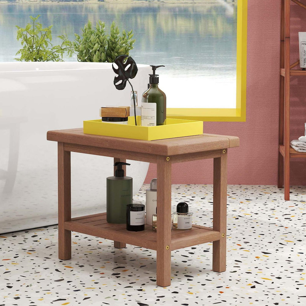 Teak utility bench with yellow tray, ideal for laundry supplies and towels, complements modern or rustic decor.