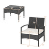 Rattan bistro chair and table set with beige cushions, ideal for outdoor patios and gardens, featuring ergonomic design.