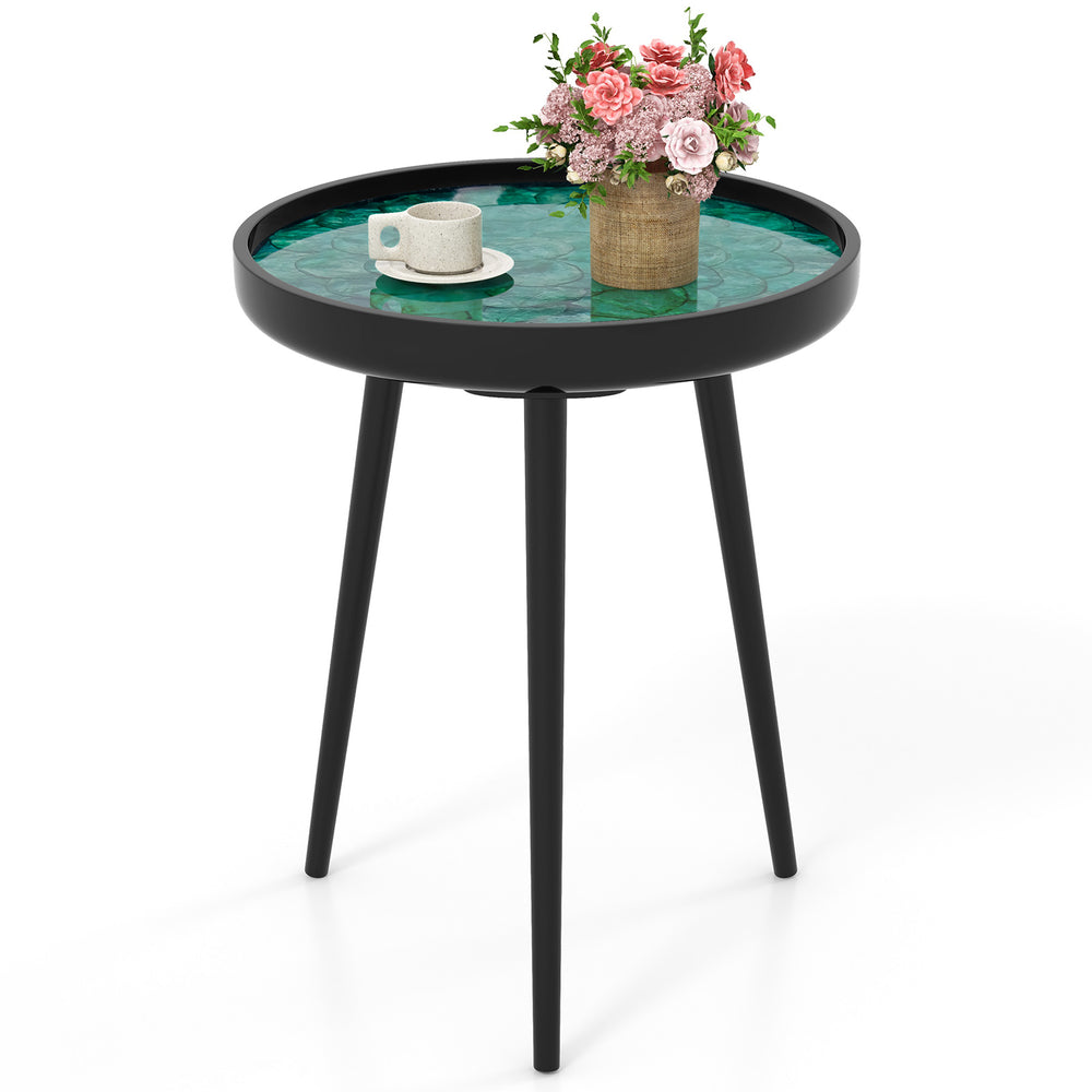 Mid-century modern coffee end table with a unique sea shell tabletop and sturdy mahogany wood legs, perfect for decor.