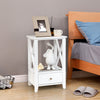 White nightstand with X-shaped design, featuring a spacious open shelf and large drawer for clutter-free organization.
