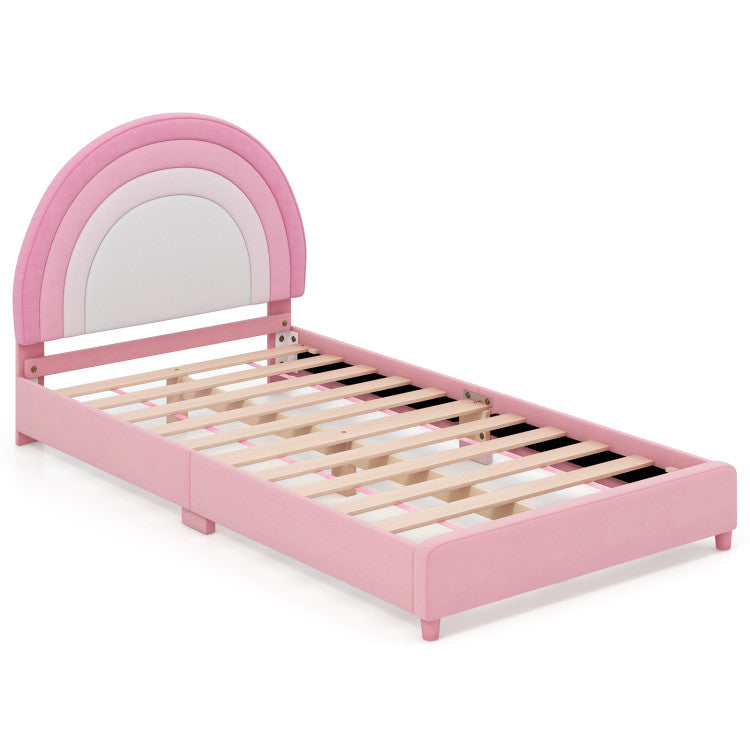 Twin bed frame in pink with a rainbow headboard, featuring sturdy wooden slats for kids' room furniture.