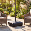 Fillable mobile umbrella base with wheels and locks, designed for stability and support in outdoor settings.