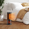 Portable 17-inch black tower space heater with 135° oscillation, PTC heating, and LED 3D flame effect for cozy warmth.