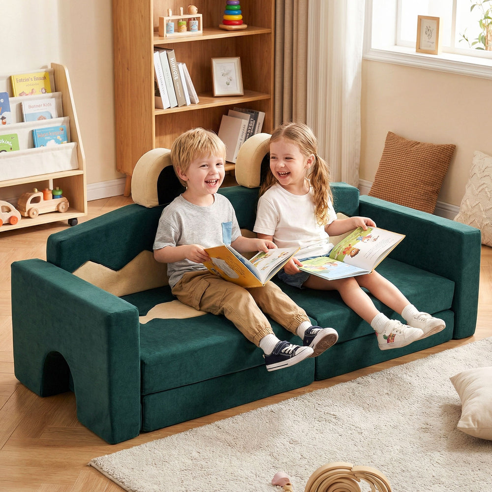Modular kids play couch in green velvet, featuring two children reading, perfect for inspiring creativity and family.