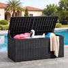Black 180 Gal outdoor deck box with lid, ideal for pool supplies and garden tools, doubles as a bench for seating.
