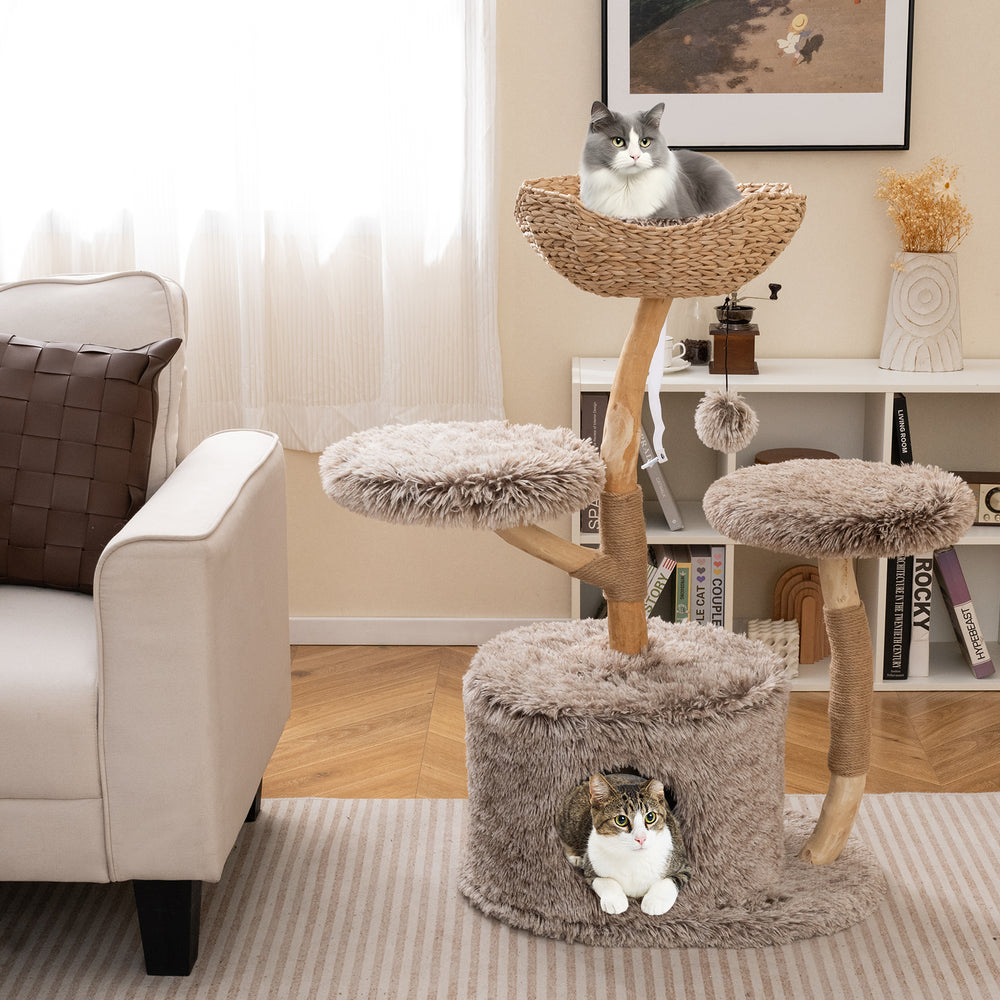 Wood cat tree with cozy perch and sisal scratching posts, featuring soft plush fabric for comfort and play.