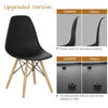 Black Mid-Century Modern DSW dining side chair with ergonomic back and wood legs, ideal for stylish dining rooms.
