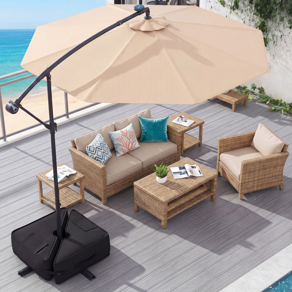 Square umbrella base weight in black with detachable sandbag design, suitable for patio and garden use.