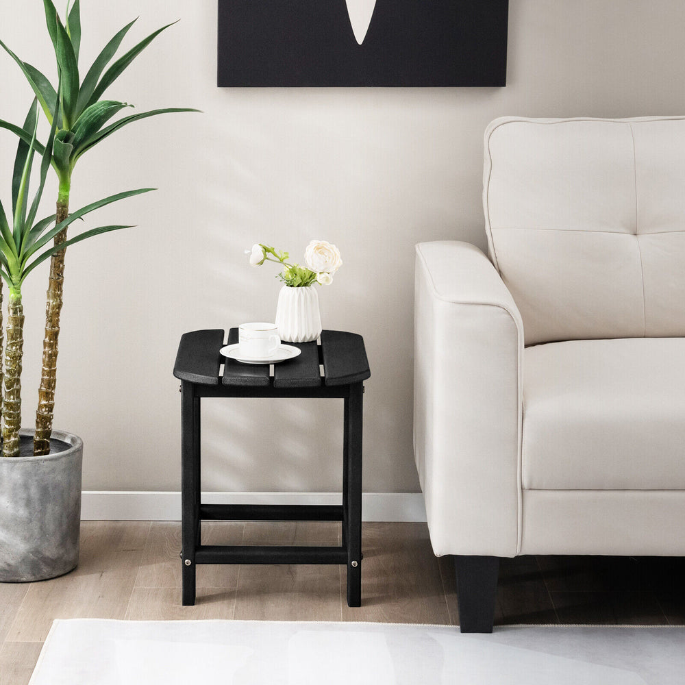 Black 18-inch weather-resistant side table made of HDPE, perfect for outdoor use beside chairs or indoors for added.
