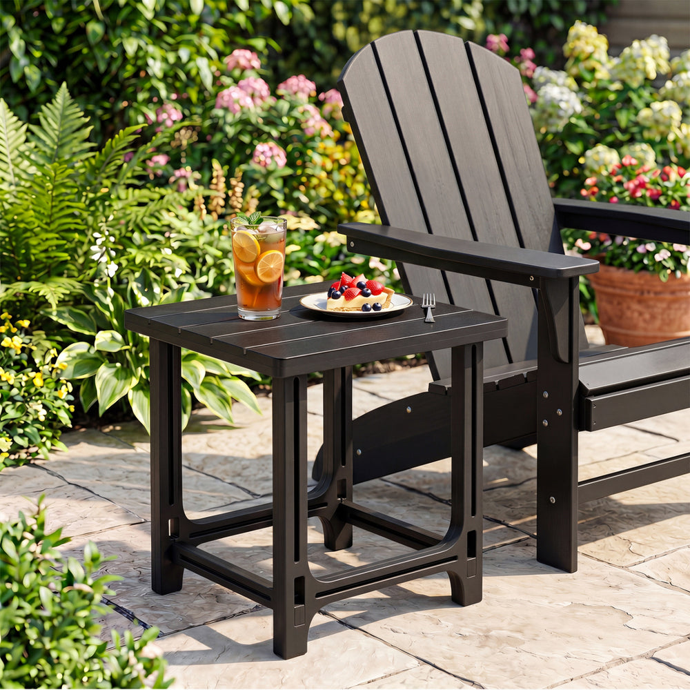 The black 18-inch outdoor Adirondack side table with a wood-look texture is designed for stylish and durable outdoor use.